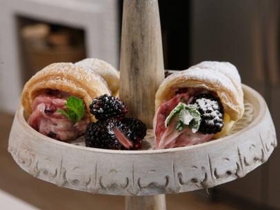 Cream Filled Puff Pastry with Blackberry Compote is displayed, as seen on Let's Eat, Season 1.