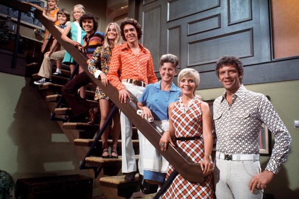 UNITED STATES - DECEMBER 10:  2226_1 -- THE BRADY BUNCH -- 9/69, TRACKING #7725, Mike Brady (Robert Reed), an architect with three sons, married Carol (Florence Henderson), a widow with three daughters. Their children were, from bottom: Greg (Barry Williams), Marcia (Maureen McCormack), Peter (Christopher Knight), Jan (Eve Plumb), Bobby (Mike Lookinland) and Cindy (Susan Olsen). Alice (Ann B. Davis) was the family's housekeeper.  (Photo by ABC Photo Archives/ABC via Getty Images)