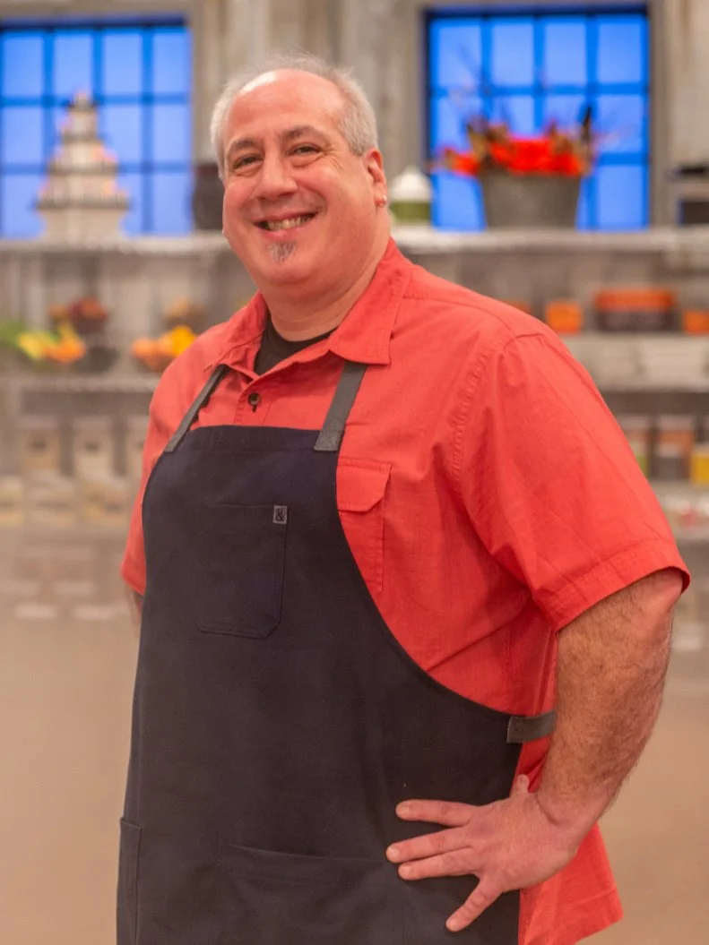 Contestant Brian Fishman poses for a photo, as seen on Food Network's Halloween Baking Championship Season 4.
