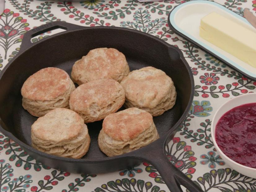 A  hot pan of Heirloom Rye Biscuits served with fresh Ponchatula Strawberry Jam and butter as seen on Cajun Aces, Season 2.