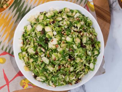 Katie Lee makes Shaved Brussels Sprout Salad with Dates, Manchego, and Almonds, as seen on Food Network's The Kitchen 