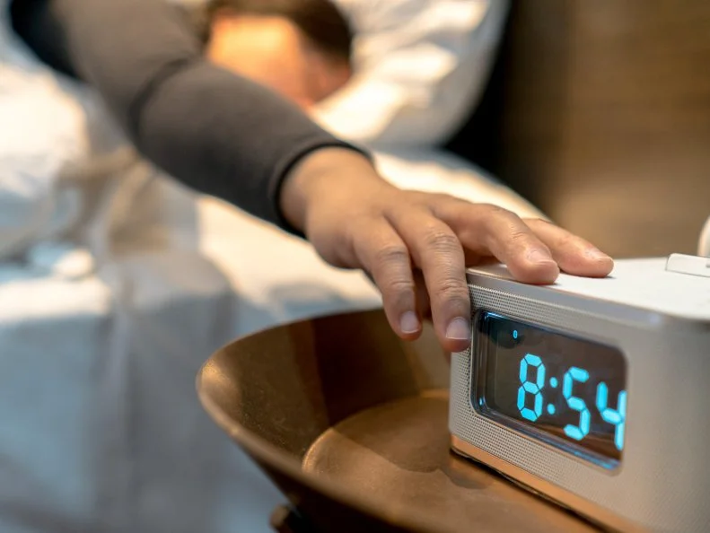 alarm clock at bedside