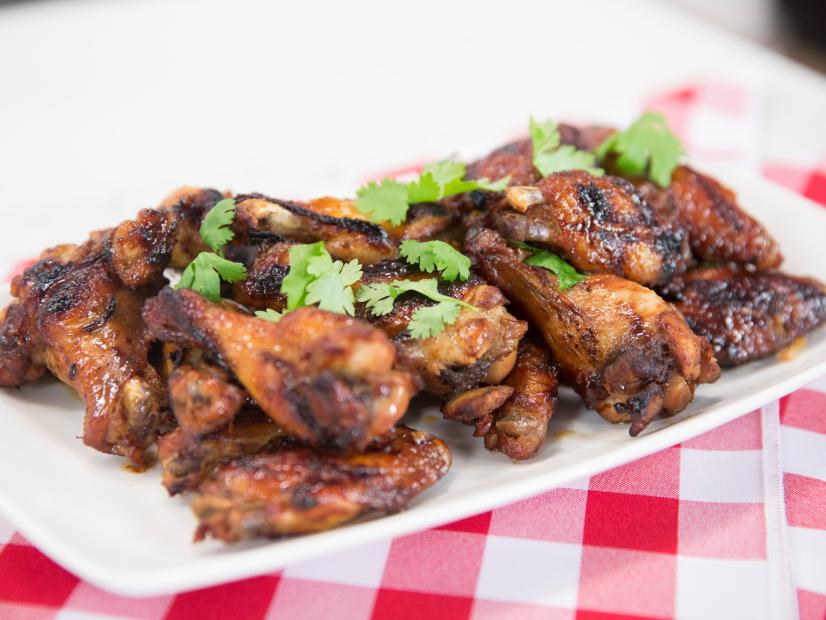 Food and Lifestyle Expert Brandi Milloy shares her wonderful tailgate recipe of her Filipino grilled chicken wings top with cilantro garnish, as seen on Food Network Lets Eat Episode 109.