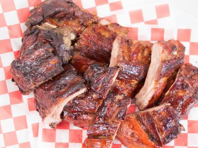 Chef Stuart O'Keffee shares his Make & Take Sticky Ribs recipe that is perfetct to start at home and be finished at the tailgate on the grill, as seen on Food Network Lets Eat Episode 109. 