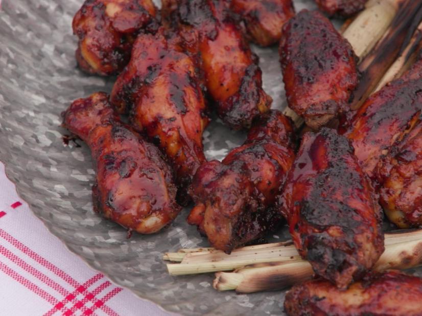 These yummy wings are grilled with split sugar cane on the grill to impart a sweet smokiness as seen on Cajun Aces