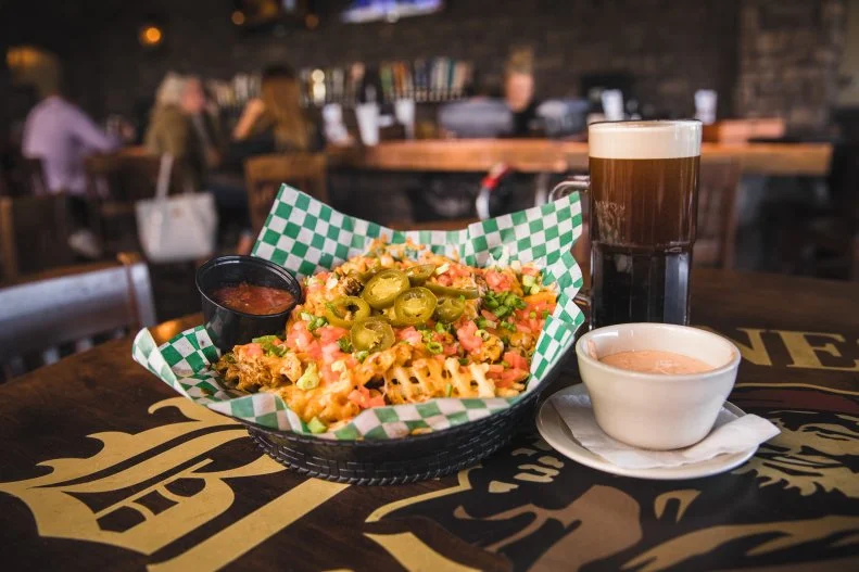 Most North Dakotans claim Scandinavian and German ancestry, but the state also boasts a sizable Irish population. Alluding to this is the Blarney Stone, a pub that was co-founded by a South Fargo High School grad and has locations in West Fargo and Bismarck. Finnegans Irish Amber goes down best with the Irish Nachos, a pileup of waffle fries, beef, chicken, melted Jack-cheddar, tomato, jalapeno and green onion. A secret sauce reminiscent of Thousand Island dressing-meets-sour cream pleasingly stands in for salsa.
