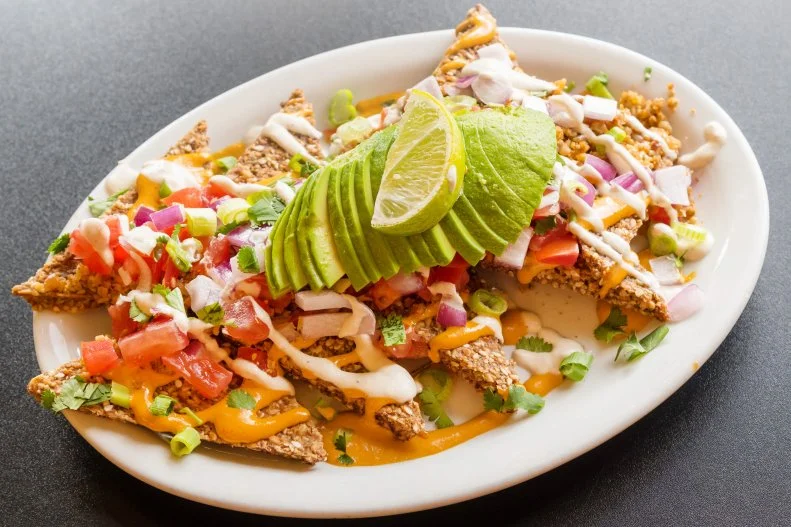 There’s always been vegan-friendly dining in funky Portland, a city that places a premium on health and wellness. One of the standout vegan restaurants is Blossoming Lotus, in the northeast part of the city. Its gluten- and soy-free Live Nachos are a refreshing twist on the typically colossal dish, made with spicy sprouted chips, cheese sauce, pecan chorizo and cashew sour crema, as well as the familiar lineup of onion, tomato, avocado, scallion, cilantro and lime. Try them after a round of the bar’s beet-infused-vodka cocktails.