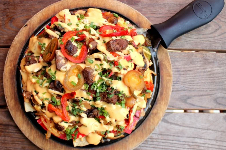 Nacho Daddy, with Las Vegas locales on the Strip, downtown and in Summerlin, is an upbeat grill that puts margaritas and myriad permutations of nachos — from Thai chicken to sloppy joe — in the limelight. There are even Golden Knights Nachos, named for Vegas’ ice hockey team, with ingredients such as queso, carne asada, mushrooms and pickled cherry peppers. That’s just one of the ways that Nacho Daddy connects with the community; it has also donated hundreds of thousands of meals so far to local food bank Three Square.