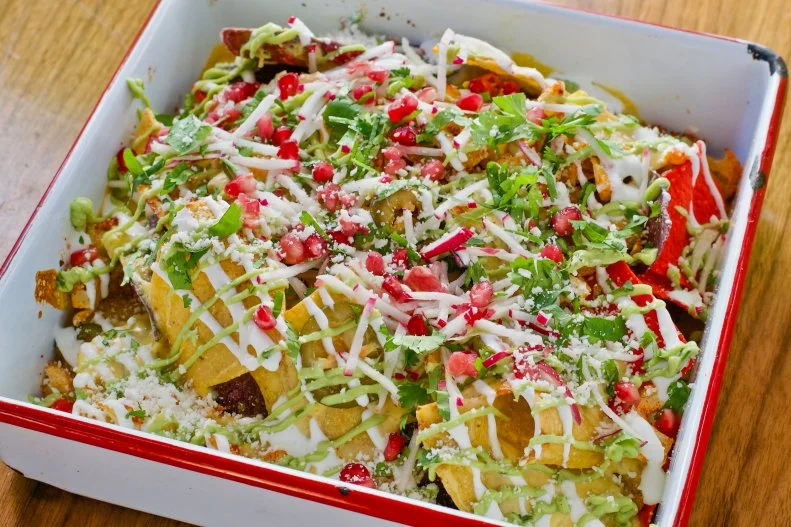It isn’t just playful cocktails like the Sweet Potato Pain Killer and the Rye Tai that keep guests returning to the laid-back Sweet Liberty in Miami’s Collins Park neighborhood. Its solid menu of comforting bar grub is also a hit, including the vegetarian cauliflower nachos that showcase a blended cheese sauce, avocado crema, cilantro, radish, green chile and pomegranate.