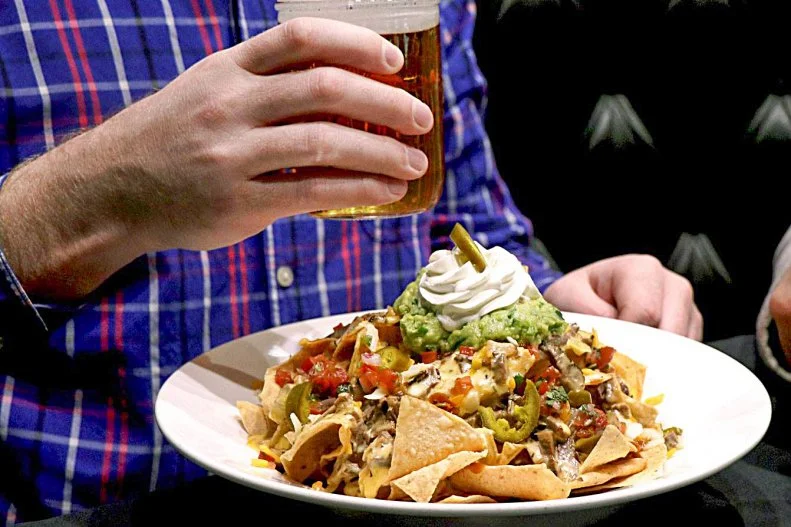 When in Omaha, one is never far from a good steak. Capturing the cityâ  s predilection for beef is Tavern 180â  s Kobe beef brisket nachos. At this West Omaha hot spot with iPad menus and edamame-and-flatbread happy hours, the well-marbled brisket is smoked for some 13 hours before itâ  s settled atop housemade chips with cheddar, jalapeno, pico de gallo, guacamole and sour cream.