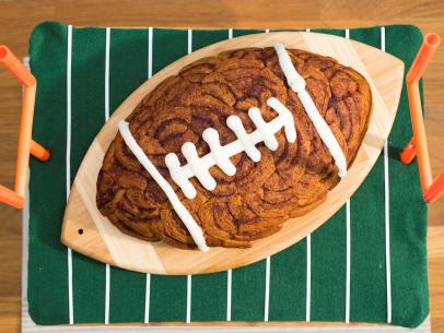 Geoffrey Zakarian makes a Pull Apart Cinnamon Roll Football, as seen on Food Network's The Kitchen