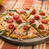 Katie Lee makes Spaghetti Squash Crust Pizza, as seen on Food Network's The Kitchen