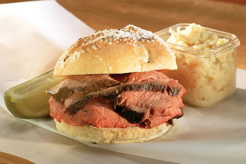 It sounds fancy and exotic, yet at its core the beef on weck is just a really good, really flavorful roast beef sandwich from Buffalo, New York. What sets it apart from other regional variations is the freshly grated horseradish sprinkled inside the special kummelweck (or kimmelweck) roll, similar to a kaiser but seasoned with fragrant caraway seeds and plenty of pretzel salt. Like all regional icons, this juicy, strongly spiced sandwich is found all throughout the city. Knowledgeable locals and visiting chefs prefer the version from Charlie the Butcher, where beef is slow-cooked for 18 hours, then sliced and dipped in bold au jus and sandwiched together with all the traditional trappings.
