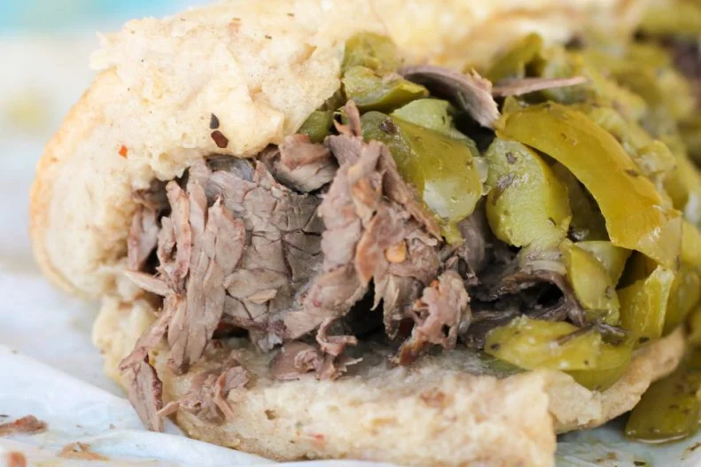 Sure, Chicago is known for hot dogs, deep dish pies and the predecessor to the Bloominâ   Onion, but the cityâ  s greatest claim to culinary fame lies in its Italian beef. The sandwich is totally unique to the Windy City and inspires fierce debates on who makes the best. Johnnieâ  s Beef in Elmwood Park is always somewhere on the list. Locals join the perennially long queue for a taste of its thin-shaved roast beef topped with spicy and sweet pepper giardiniera jammed into an airy white roll dipped in gravy. Similar to staffers at Phillyâ  s cheesesteak joints, the brusque folks behind the counter expect you to know your order as soon as you approach. Repeat after us, â  beef, sweet, hot and dipped.â  