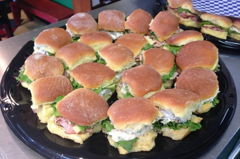Americans have been mixing chicken with mayonnaise since the 1700s to serve on salads, in lettuce cups, heck even straight out of the bowl, but everyone knows itâ  s really best in a sandwich. One favorite place to try the classic is the homey Cheddar Box in Louisville, Kentucky. Using the freshest ingredients, the lunch hotspot prepares three different versions. Its world-famous features homemade mayo and celery. The curry incorporates chutney mayonnaise, red onion, celery, grapes and almonds. And the honey-pecan can turn even the most ardent savory-sweet hater around with its vibrant blend of honey mayonnaise, dried cranberries, celery and pecan. Get your pick tucked inside white, whole wheat, marbled rye or a butter bun.