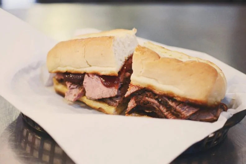 Although most barbecue fanatics tend to concentrate on the south, Californiaâ  s Central Coast is also a hotspot for smoke-kissed meat. Inspired by the areaâ  s deep rancho roots, grill-masters have long finessed tri-tip, a lesser-known cut from the top of the sirloin. Throughout the region these Santa Maria steaks are grilled to medium-rare, then stuffed inside a French roll. Youâ  ll find an excellent representation at San Luis Obispoâ  s Firestone Grill, where thin slices of oak-scented tri-tip are simply served with house-made barbecue sauce on a French roll.