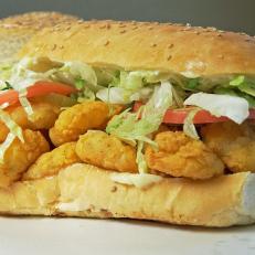 New Orleans is famous for sandwiches like po'boys.  Zimmer's Seafood's fried shrimp version is served on bread from their neighbors, John Gendusa Bakery, as seen on Food Network's Baked season 1