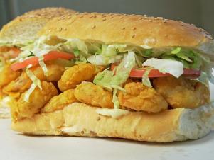 New Orleans is famous for sandwiches like po'boys.  Zimmer's Seafood's fried shrimp version is served on bread from their neighbors, John Gendusa Bakery, as seen on Food Network's Baked season 1