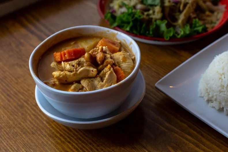 The colorful curries and stacks upon stacks of noodles are brimming with flavor at this traditional Thai cafe where most of the menu items are under $10. The mild and slightly sweet sweet, coconut milk-based Kang Massaman curry ($8.95) is hearty, with blocks of potato, tomato, and your choice of chicken, beef, pork or tofu (add $1 if you prefer shrimp or fish). And the large-enough-for-two platter of seafood pad Thai ($9.95) is packed with shrimp, fish, bean sprouts and a sprinkling of chopped peanuts.
