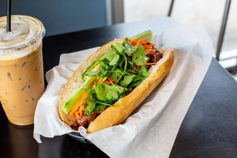 As a true melting-pot city, Houston boasts fantastic ethnic eats. Vietnamese food ranks high on the list, with tasty options at every turn, but few spots run as swiftly as Les Givral's in Midtown. Like a well-oiled machine, this high-traffic cafe shells out its famous banh mi sandwiches ($2.75) and Vietnamese iced coffees as soon as the line begins forming for lunch each day. Flaky buns are in and out of the toaster faster than you can say "char-grilled pork or tofu," and tall glasses filled with condensed milk and bold black coffee tower high against the wall like a work of art.