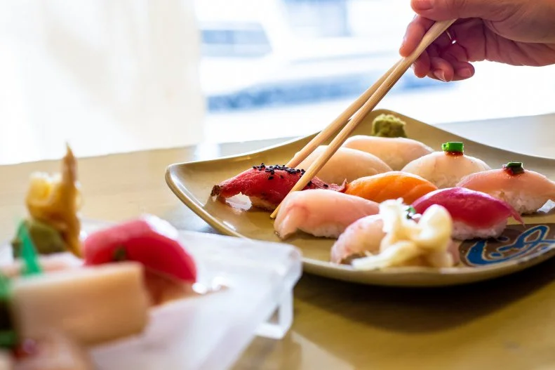 The crowds pack into this unassuming sushi bar in Greenway and fill their tables with colorful jewels of raw fish and more. Yakitori and deep-fried shrimp tempura will run you $3.50, hand rolls are $2.50, and single pieces of flounder, Spanish tuna and whole scallop are just $1 each. Big spenders may even spring for the ice cream-topped fried banana for dessert — relatively steep at $4.50 compared with the $1.50 red-bean mochi.