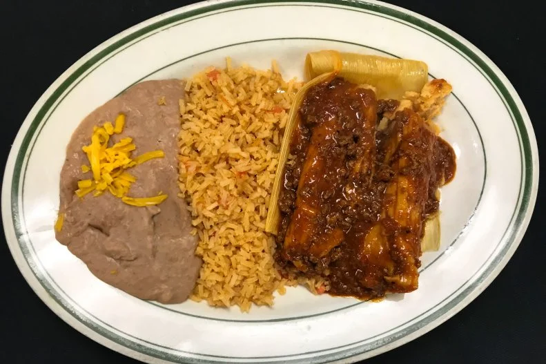 Tracking down bargain Tex-Mex eats in the Space City isn't exactly rocket science, but where to start? Taco stand or taqueria? Tamale guy or empanada hut? The possibilities are endless. At El Real, a flashy 1930s-era Montrose cinema hall-turned-restaurant, all of these questions are answered (and more) in the way of a true Tex-Mex menu with plenty of authentic platters under $10. A sampling of three fiery pork tamales topped with chili con carne is presented in the Tamale Skillet for $7.99, and a duo of Suave Tacos â   with savory pulled pork, smoked chicken or tender ground beef, in a soft flour tortilla â   are served with the traditional accompaniment of beans and rice for $9.99.