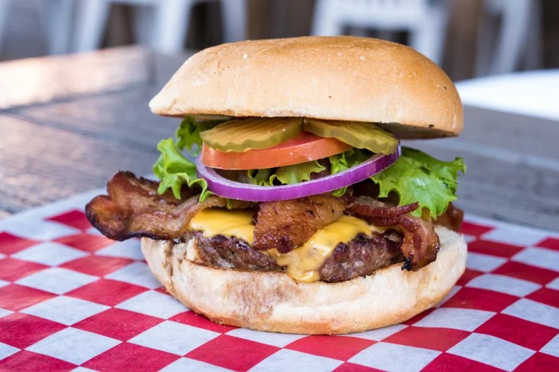 Since 1993, this neighborhood gem by Gr8 Plate Hospitality's Paul Miller has been serving up a menu of classic Texas fare for diners with Texas-sized appetites. Today there are three locations, and with a 100-percent-from-scratch kitchen and grilled specialties cooked over the restaurant's live-fire mesquite grill, dishes are never boring. The Jax Burger, a longtime best-seller and a bargain at $5.25, is piled high with a fresh, never-frozen beef patty, lettuce, tomato, pickles and sliced red onion on fresh-baked bread that's toasted to order.