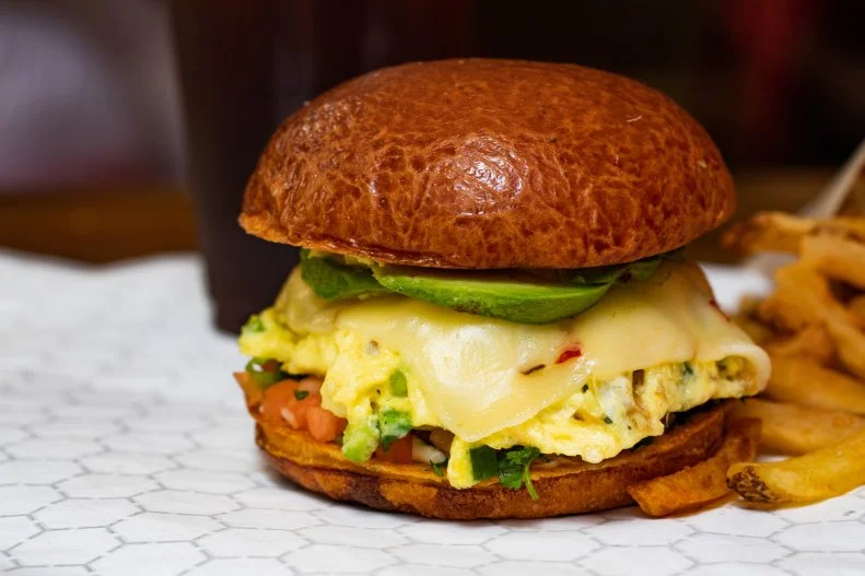 It's hard to bypass the doughnuts when you walk in the door (hello, Michigan apple fritter), but if you're in the mood for something savory, a breakfast sandwich is the way to go. The Vera Cruz is inspired by chilaquiles — in portable mode — with sauteed jalapenos, corn tortilla strips and scrambled eggs topped with pepper Jack cheese. It's topped with pico de gallo and avocado, and served on a brioche bun made by local 3D Baking. If you really can't resist those doughnuts, you substitute two of them for the bun in your sandwich  … or just take one home to indulge in later.