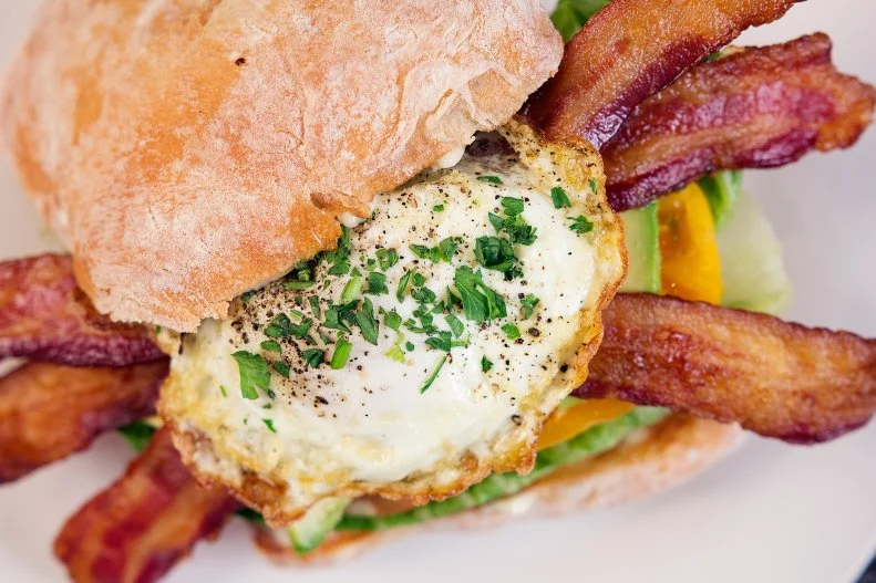 Italian food is usually the draw at this JW Marriott restaurant, but the more American-leaning breakfast is a favorite of those who work in the area. The breakfast BLT takes the best of the classic sandwich and adds a breakfast twist. The sandwich is served on a ciabatta roll with a fried egg, heirloom tomato (when in season), lettuce, avocado, plenty of bacon and a drizzle of mayo, of course.