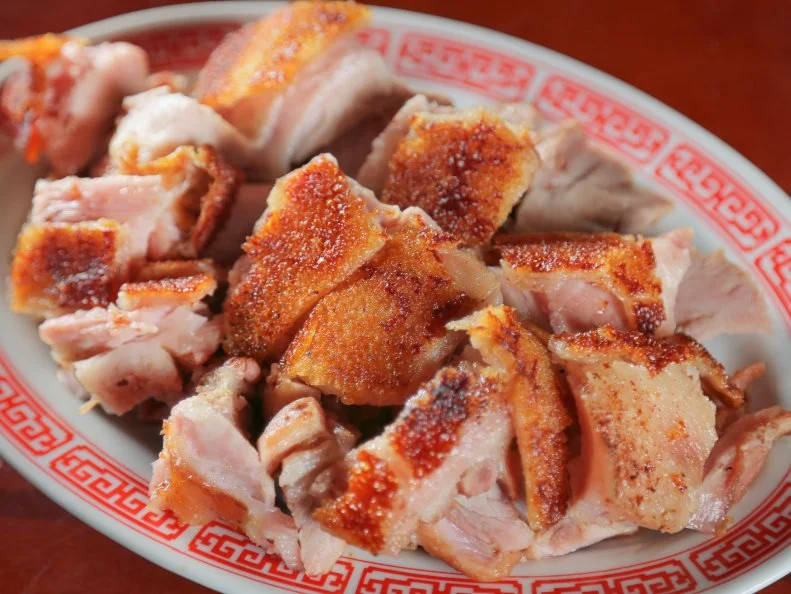 The Roast Pig as Served at Sun Wah BBQ in Chicago, Illinois, as seen on Diners, Drive-Ins and Dives, Season 29.