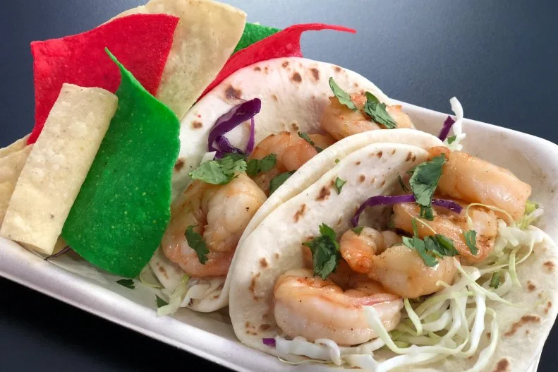 Guests looking for a lighter take on stadium fare might find their perfect match at Craft Taqueria on the 100 concourse, where shrimp are marinated in Goose Island beer, lime and ancho chiles and paired with fresh cilantro, shaved cabbage and red onions. Each order of two flour-tortilla tacos comes with house-fried cumin-dusted tortilla chips and your choice of tomatillo salsa verde or chile de Arbol-spiked salsa rojo. Wash them down with a Georgia-brewed craft beer from one of any number of nearby stands.