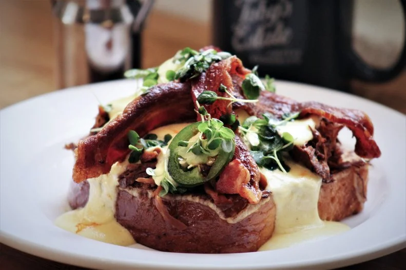 Brunch is big in Savannah, and there's no better place to see and be seen than at Australian-inspired The Collins Quarter. This ode to Melbourne's historic Collins Street pairs specialty coffees (the Lavender Mocha is to die for) and elegant cocktails (think bloodys, mimosas, bellinis, and rosés) with innovative and land-down-under-leaning cuisine. The Swine Time Beni is luscious brioche French toast topped with pulled pork, a poached egg, hollandaise and bacon. Leo's Aussie Breakkie is a bit heartier, with healthy portions of Italian sausage, bacon, eggs, baked beans, mushrooms and a grilled tomato. And the #Tag This Hash is a tasty mashup of braised pot roast, potato hash cakes, smashed avocado, a fried egg and chimichurri.