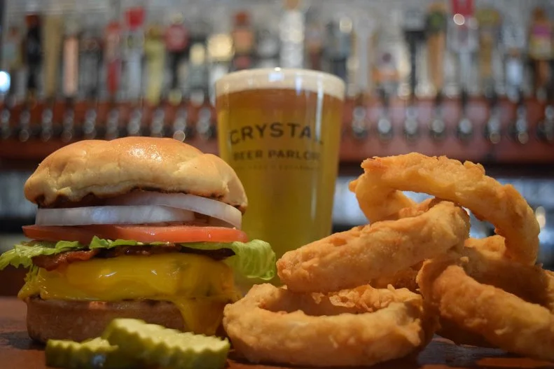 Situated in what was once the Gerken Family Grocery Store, "The Crystal" opened in 1933 and is reputed to have been one of the first restaurants to serve alcohol after the repeal of Prohibition. Enjoy your choice of more than 85 beers — including a selection of "Beers of Our Fathers" (hard-to-find time-honored beers) and a host of burgers, including an au poivre burger, Greek lamb burger, meatloaf burger, bison burger, the classic griddled half-pound Crystal Burger, which has been on the menu for 80-plus years, and the N.O.G.S. (North of Gaston Street) burger with bacon, balsamic-marinated sauteed portobello mushrooms, Brie and fresh spinach. Splurge on the onion rings, which are always freshly prepared and fried to order.