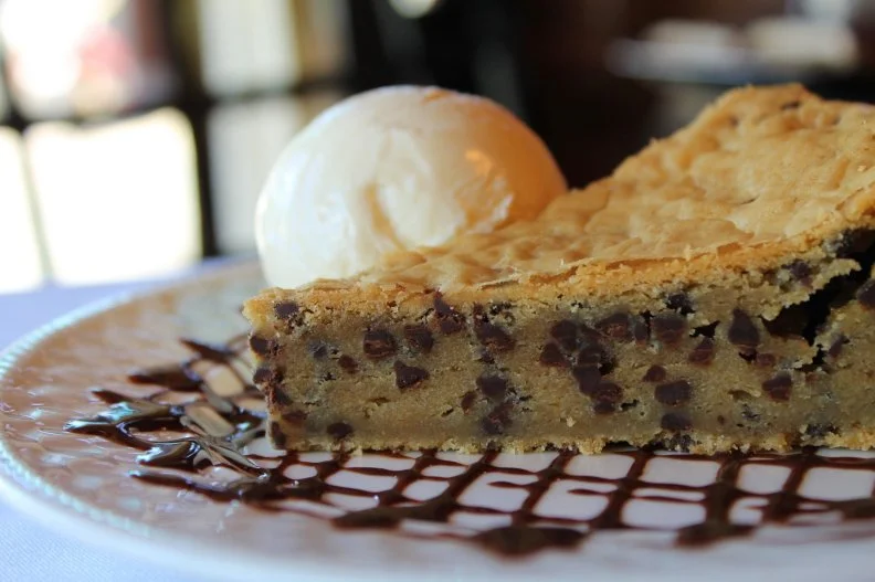 Devoted to scratch-made desserts and creative cocktails, Lulu's Chocolate Bar is definitely on the "Why didn't I think of that?" list. Start at the bar (daily happy hour until 7:00 p.m.) and enjoy one of the 20 different martinis — many of which feature chocolate, like the Lulutini or the Milky Way — or a chocolate beer or deep ruby-red wine. Then move on to dessert with a savory cheese board or a sweet treat like Lulu's strawberry suspension cake, white chocolate chip cheesecake, triple chocolate mousse served on a disc of pure chocolate with a chocolate sauce bath, or the Big Cookie (pictured), a giant, delicious mini-dark-chocolate chip cookie that's cut into a pie wedge, heated and served with vanilla ice cream.