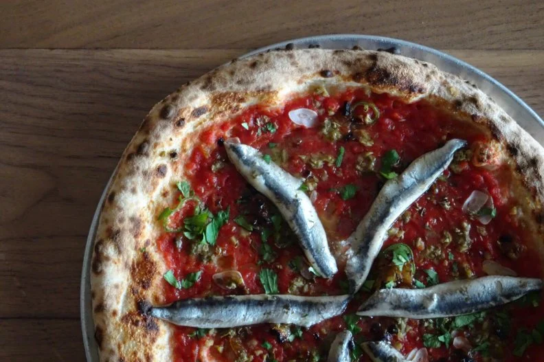Austin has a surprisingly deep pizza scene. Arguments abound about who serves the best slice, but as an all-around restaurant, Bufalina wins hands down. Few spaces in town capture the same understated cool; it strikes a perfect balance between date spot and place to bro-out on some 'za. The oven is right there in the dining room, constantly cranking out bubbly crusted Neapolitan pies from open to close. The hippest servers in town dance between the packed tables, attentive and friendly but never overbearing. The pizza is the main course, but with apps like ricotta gnocchi in cactus pesto and snapper crudo with prickly pears, you could easily skip the pies altogether.