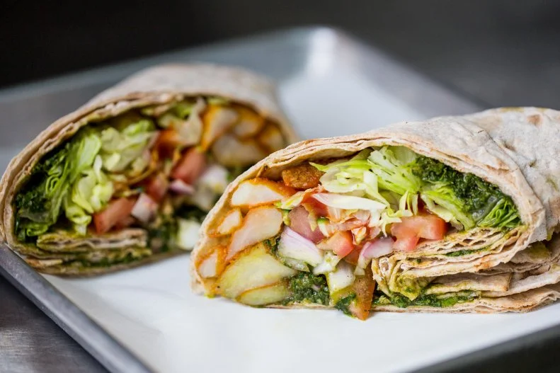 Sarkis Vartanian has brought sandwiches from around the world together under one roof at this takeout window. Though the Chip Butty originally hails from Britain, the one here draws from Vartanian's childhood in Syria, where his mom used to whip up her version as a weekend treat. In Es Todo's cheffed-up wrap, crispy twice-cooked French fries, chopped tomatoes, diced red onions, Heinz ketchup and a spicy green schug sauce are crammed into lavash flatbread, forming a burrito that feels uniquely LA.