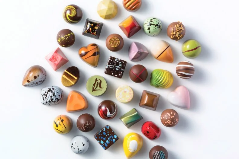 The Sunshine State might not be the first place you'd look for handcrafted chocolates, but since 2001 Norman and Mary Love have been crafting beautiful and delicious creations in their shop in Fort Myers. Each truffle has its own aesthetic, like the "paint"-splattered dark chocolate heart infused with jalapeno peppers, or the vibrant green and yellow, tangy Key lime seashell. The gift boxes in the Black line are filled with single-origin dark chocolates.