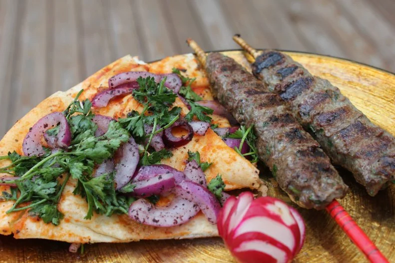 "Eat Healthy for a Good Cause" is the motto at Fava Pot, a beloved D.C. truck that's also birthed a brick-and-mortar business. That means every purchase of gluten-free fava bean falafel, antibiotic-free grilled Cornish hens sprinkled with sumac, and Egypt's vegetarian street staple, koshary (lentils, rice, chickpeas and pasta, bathed in spicy tomato sauce) goes to fund founder Dina Daniel's work with Coptic Orphans. Building on their Valuable Girl Project (a development program that empowers young women through educational mentoring), she currently sponsors Coptic Girl Rising, offering scholarships to gifted girls with college aspirations.