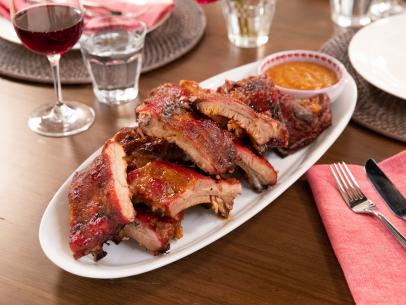 Food Beauty of Giadas Baby Back Ribs with Spicy Peach BBQ Sauce as seen on season 4 of Food Networks Giada Entertains