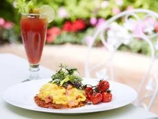 Going to brunch at the Beverly Hills Hotel feels more like going sightseeing than eating breakfast. From the instant you roll up to the iconic pink hotel to the moment when you find your seat on the sunny Polo Lounge patio, you'll want to stop and take photos like a tourist. Served only on Sundays from 11 a.m. to 3 p.m., the Beverly Hills Hotel brunch offers people-watching as great as the food. Seeing as you're in Beverly Hills, you should probably have some caviar to start the day. Order the Smoked Salmon Soft Scramble with wild smoked salmon, potato rosti, creme fraiche, caviar and asparagus.