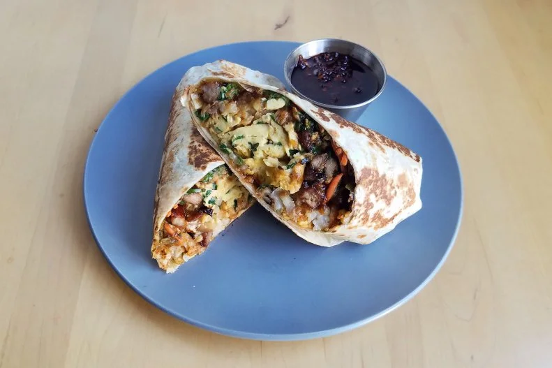 At Little Fatty in Mar Vista, Chef David Kuo serves "dim sum and then some" for weekend brunch, available from 11 a.m. to 3 p.m. This brunch is for those seeking something savory, whether you go the classic dim sum route or opt for one of Kuo's more innovative dishes. That lineup is crazy, in a great way. Try the fried Hainan chicken and waffles or moo shu breakfast burrito, and don't miss sides of the five-spice bacon or Sichuan potato tots.