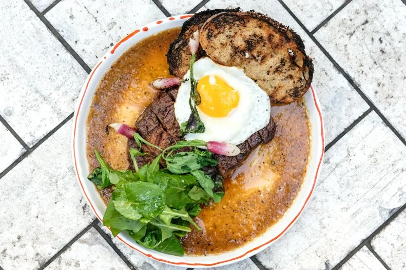 Something as simple as steak and eggs becomes a lot more interesting when it's cooked by Peruvian chef Ricardo Zarate at Rosaliné, his new West Hollywood stunner. Available on Sundays between 10:30 a.m. and 2:30 p.m., the brunch will satisfy your meat cravings with dishes like the Salchipapi, made with chorizo, Serrano ham, morcilla potatoes, rocoto ketchup and amarilla mustard aioli, not to mention that steak and eggs (aka parrillada de carne) with apple-ginger-soy dressing and quinoa toast. Sit at the chef's counter to watch the experts prepare your brunch, maybe even with a Quita Calzón cocktail made with mezcal, gooseberry, coconut water and lime.