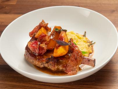 Host Tyler Florence and special guest Steven Crowley's pork chops with peach polenta dish, as seen on Worst Cooks In America, Season 15.