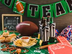 Game day football party table with beer, chips and salsa