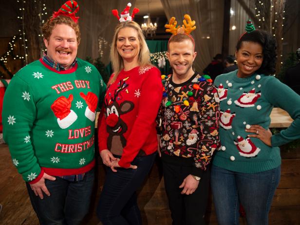 Host Casey Webb and judges Amanda Freitag, Zac Young, and Jocelyn Delk Adams, as seen on Santa's Baking Blizzard, Season 1.
