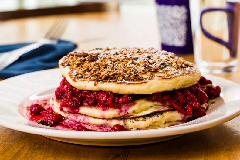 Coffee from local roaster Blueprint flows at this popular husband-and-wife-run joint in suburban St. Louis. Tackling the hot fried chicken sandwich on brioche for lunch is a good idea, but consider breakfast here, too, with a spread of housemade sausage biscuits, jalapeno-spiked breakfast fried rice and oven-baked oatmeal. The triple-stacked Clara Cakes, named for the couple's daughter, are also tempting, with their plumped-up layers of raspberry jam, mascarpone and granola.