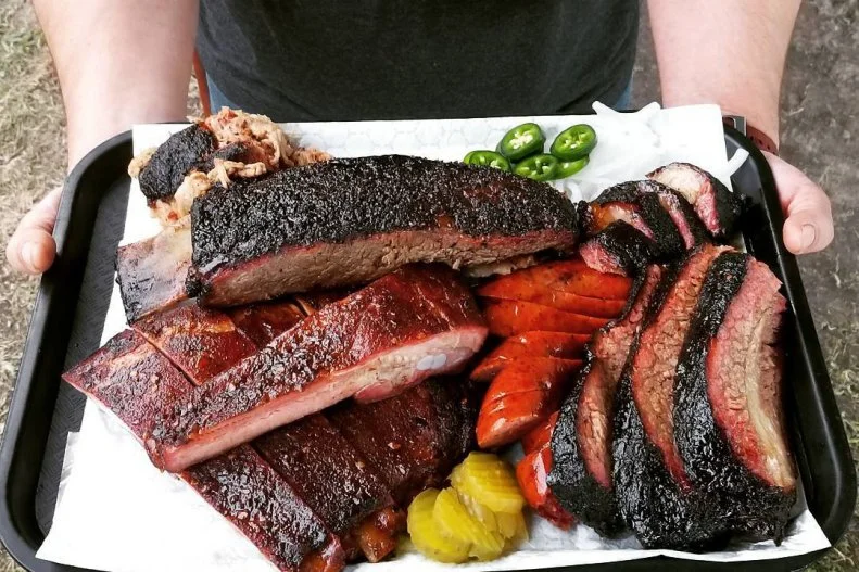 Husband-and-wife team Will and Nichole Buckman run this quaint Old Town Spring restaurant where beer and wine flow like barbecue sauce and the patio is both child- and pet-friendly. Saucy brisket sandwiches are made extra messy by adding a helping of coleslaw on top, and the sticky pork spareribs are good to the bone.