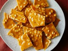 This sweet and salty peanut brittle has the perfect crunch and sheen. With a little patience, you'll have a delicious brittle to serve to party guests or as an edible gift around the holidays.