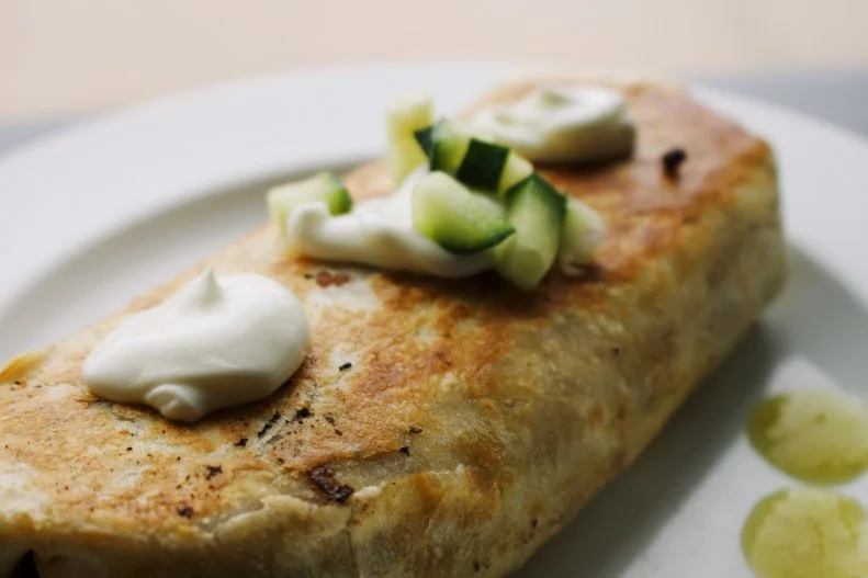 In Cedar Rapids, you can feast on the best breakfast burritos around at Brewhemia. The best part? You can customize the fillings to your liking to create the perfect bite. Start with a base of eggs, cheese and refried beans, and then choose from best-selling chorizo, sauteed vegetables, ham and potatoes — or be bold and add them all. The chef is originally from Mexico, so expect the housemade salsas meant for dunking to be standouts.