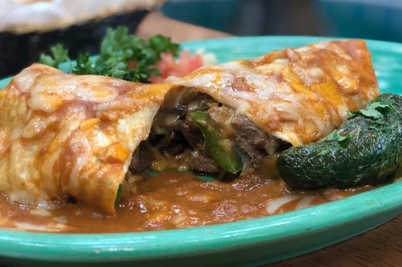 Looking for a burrito in Sin CIty? Hit Pancho's Mexican Restaurant for the Philly Burrito. Think savory strips of grilled flat iron steak, bell peppers, onions, mushrooms and lots of oozy, melted cheeses, topped off with the most-perfect enchilada sauce around. Available on both lunch and dinner menus, this burrito-cheesesteak hybrid should be on your Las Vegas must-eat list.
